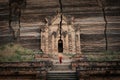 Novice Buddhist Monk at the Ruins of the Mingun Pahtodawgyi Pagoda in Sagaing, Mandalay, Myanmar Burma Royalty Free Stock Photo