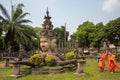 Novice Buddhist Monks at Xieng Khuan Buddha Park in Vientiane, Laos Royalty Free Stock Photo