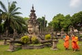 Novice Buddhist Monks at Xieng Khuan Buddha Park in Vientiane, Laos Royalty Free Stock Photo