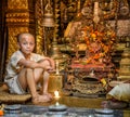 Novice at a buddhist temple in Kathmandu, Nepal Royalty Free Stock Photo