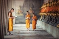 Novice monks reading book inside monastery at Ayutthaya province Royalty Free Stock Photo