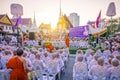 Novice ordination ceremony of a summer tradition, Newly ordained Buddhist monk pray with priest procession in temple at Bangkok,