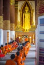 Novices monk vipassana meditation at front of Buddha statue Royalty Free Stock Photo