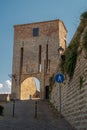 The gate tower of the walled village of Novilara Royalty Free Stock Photo