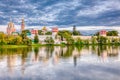 The famous Moscow landmark with Golden domes and a reflection of the landscape on the water of the Park pond against the