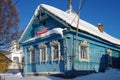 NOVOE, YAROSLAVSKAYA OBLAST, RUSSIA - February, 2018: The wooden old russian house in winter day Royalty Free Stock Photo