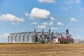 Modern processing complex of grain crops on background of blue sky