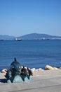 Novorossiysk, Russia - July 3, 2018: The bronze sculpture of dolphins at the embankment