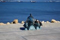 Novorossiysk, Russia - July 3, 2018: The bronze sculpture of dolphins at the embankment