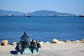 Novorossiysk, Russia - July 3, 2018: The bronze sculpture of dolphins at the embankment