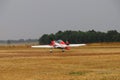 Sports ultralight aircraft take off from the airfield Royalty Free Stock Photo
