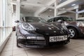 Front view of the 2006 sport porsche boxster s sedan prepared for sale and exhibited in the showroom with a polished shiny black