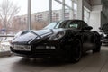 Front view of the 2006 sport porsche boxster s sedan prepared for sale and exhibited in the showroom with a polished shiny black