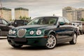 Brightly green Jaguar S-type 2007 front view Royalty Free Stock Photo