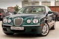 Brightly green Jaguar S-type 2007 front view Royalty Free Stock Photo