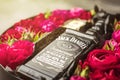 NOVOSIBIRSK, RUSSIA - FEBRUARY 23, 2018 - gift wrapping of JackDaniels whiskey. Cubes from Belgian white chocolate.