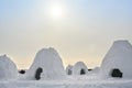 NOVOSIBIRSK, RUSSIA - FEBRUARY 19, 2023: View of the many igloo, the traditional shelter of the northern peoples from the cold,