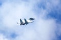 Aerobatic team VKS `Russian Falcons` Su-30 SM, russian fighter aircraft in the blue cloudy sky