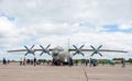 Civilians view large military transport aircraft AN-12 bk