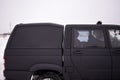 The gap between the body of the cab and the trunk of the Russian SUV `UAZ Patriot Pickup