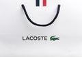 Novosibirsk, Russia, March 23, 2021 - White corporate package with Lacoste brand.