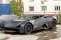 Marussia B3 front view. Photography of a Russian supercar SUV on parking. Car after crash. Royalty Free Stock Photo