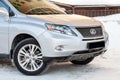 Silver Lexus RX450h 2009 release with an hybrid engine of 3.5 liters front view on the car snow parking after preparing for sale