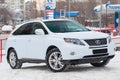 White Lexus RX450h 2009 release with an hybrid engine of 3.5 liters front view on the car snow parking after preparing for sale