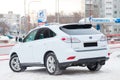 White Lexus RX450h 2009 release with an hybrid engine of 3.5 liters rear view on the car snow parking after preparing for sale
