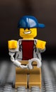 Novosibirsk, Russian Federation - February 4, 2020 Lego minifigure with happy face and unlocked handcuffs