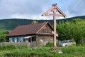 Novovarvarovka, Anuchinsky district, Primorsky region, Russia, August, 28, 2018. Worship orthodox cross at the road in the village