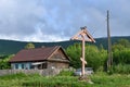 Novovarvarovka, Anuchinsky district, Primorsky region, Russia, August, 28, 2018. Worship orthodox cross at the road in the village