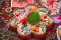 Novruz tray plate with Azerbaijan national pastry pakhlava and shekerbura purple silk scarf . Novruz copper tray plate with Azerba