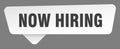 now hiring sign. now hiring white sticker isolated on gray background Royalty Free Stock Photo