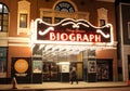 Woman walks past Biograph Theater at Night in Chicago, Illinois, USA