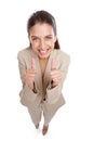 Now were talking. High angle studio shot of a beautiful young businesswoman giving you thumbs up against a white Royalty Free Stock Photo