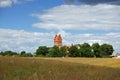 Nowa Cerkiew/pomorskie, Poland - July 20th 2013 : Rural landscape - village and a church. Royalty Free Stock Photo