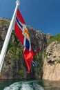 Nowegian flag, Lysefjord mountain sea landscape, Norway Royalty Free Stock Photo