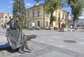 NOWY TARG, POLAND - SEPTEMBER 12, 2019: The monument portraying a highlander girl eating an ice cream