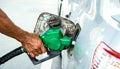 Nozzle fuel gas station fill in the car tank Royalty Free Stock Photo