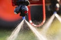 Nozzle of the tractor sprinklers Royalty Free Stock Photo