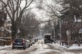 Typical North American suburban street in the suburbs of Toronto, Ontario, during a snowy afternoon Royalty Free Stock Photo