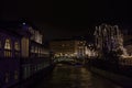 Tromostovje triple most in Ljubljana, capital city of Slovenia, taken during a winter evening with the Ljubljanica river in the Royalty Free Stock Photo