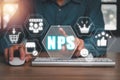 net promotor score concept, Person working on computer with net promotor score icon on virtual screen Royalty Free Stock Photo