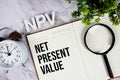 NPV - Net Present Value acronym on notepad, Business concept background Royalty Free Stock Photo