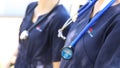 NSW Government Health worker wearing navy blue uniform and stethoscope