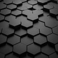 nterlocking black hexagonal tiles create a 3D geometric pattern with varying heights Royalty Free Stock Photo