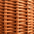 nterwoven wicker pattern, showing a tightly constructed lattice of smooth, cylindrical Royalty Free Stock Photo