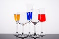 three multi-colored liquors in glasses1