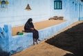 Nubian Woman Sitting, Counting Money Royalty Free Stock Photo